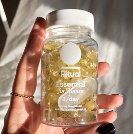 Instagram image showing Ritual's Essential for Women 18+ multivitamin bottle being held in hand