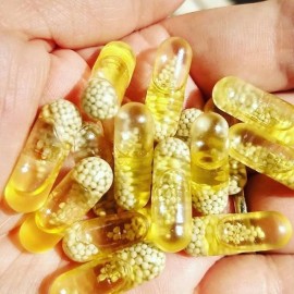 Instagram image showing Ritual's Essential for Women 18+ multivitamin capsules piled in hand